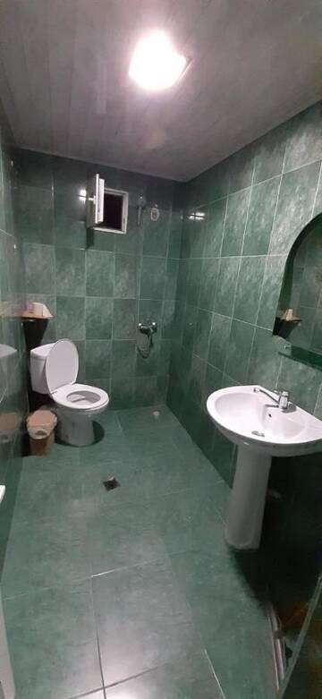 Фото номера Двухместный номер с 2 отдельными кроватями и общей ванной комнатой Гостевой дом luiza г. Батуми 8