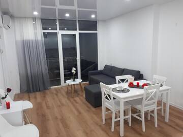 Фото номера Улучшенный семейный номер Отели типа «постель и завтрак» ORBI Residence On Black Sea Coast г. Батуми 11
