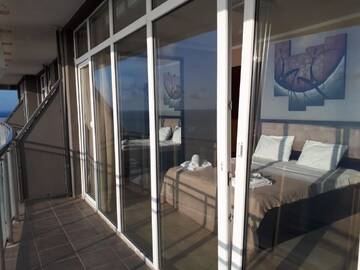 Фото номера Улучшенный семейный номер Отели типа «постель и завтрак» ORBI Residence On Black Sea Coast г. Батуми 16