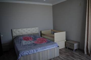 Фото номера Семейный номер с видом на море Гостевой дом House with Sea and City View г. Батуми 5
