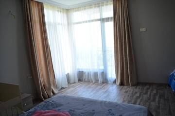 Фото номера Семейный номер с видом на море Гостевой дом House with Sea and City View г. Батуми 6