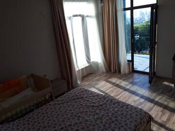 Фото номера Семейный номер с видом на море Гостевой дом House with Sea and City View г. Батуми 2