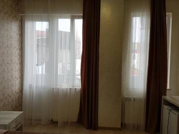Фото номера Двухместный номер Делюкс с 1 кроватью и балконом Отель MikePalace г. Батуми 2