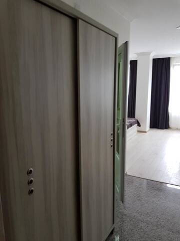 Фото номера Трехместный номер с балконом Отель MikePalace г. Батуми 7