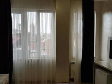 Фото номера Двухместный номер Делюкс с 1 кроватью и балконом Отель MikePalace г. Батуми 11