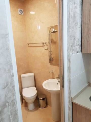 Фото номера Семейный номер с балконом Отель MikePalace г. Батуми 11