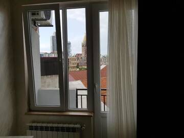 Фото номера Двухместный номер с 1 кроватью и балконом Отель MikePalace г. Батуми 7