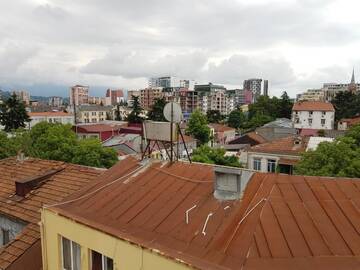 Фото номера Трехместный номер с балконом Отель MikePalace г. Батуми 5