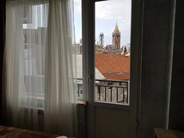 Фото номера Трехместный номер с видом на город Отель MikePalace г. Батуми 4