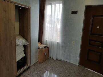 Фото номера Трехместный номер с видом на город Отель MikePalace г. Батуми 8