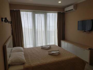 Фото номера Апартаменты-студио с видом на море Апарт-отели Apartment Orbi Beach Tower г. Батуми 45