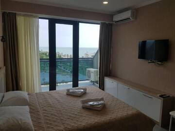 Фото номера Апартаменты-студио с видом на море Апарт-отели Apartment Orbi Beach Tower г. Батуми 53