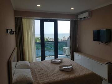 Фото номера Апартаменты-студио с видом на море Апарт-отели Apartment Orbi Beach Tower г. Батуми 12