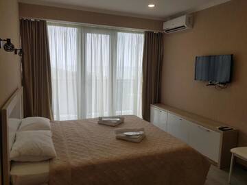 Фото номера Апартаменты-студио с видом на море Апарт-отели Apartment Orbi Beach Tower г. Батуми 20
