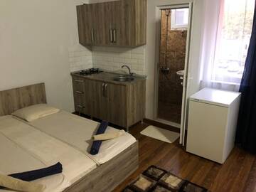 Фото номера Большой двухместный номер с 1 кроватью Гостевой дом TATUSH HOUS г. Батуми 30