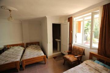 Фото номера Семейный номер с видом на сад Гостевой дом Manana Guest House г. Батуми 3