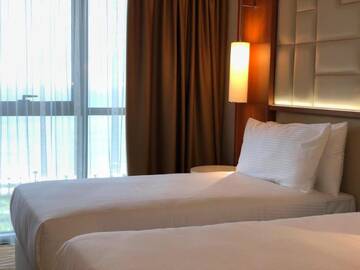 Фото номера Стандартный двухместный номер с 2 отдельными кроватями Отель Legend Hotel Batumi г. Батуми 5