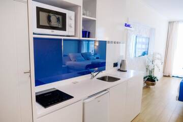 Фото номера Апартаменты-студио с видом на море Отель Orbi City Inn г. Батуми 9