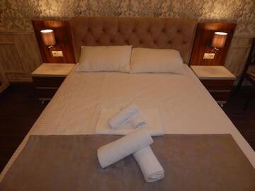 Фото номера Большой двухместный номер с 1 кроватью Отель Hotel MELINI г. Батуми 10
