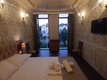 Фото номера Большой двухместный номер с 1 кроватью Отель Hotel MELINI г. Батуми 3