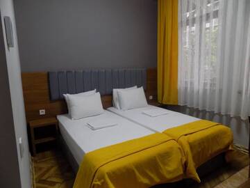 Фото номера Стандартный двухместный номер с 1 кроватью Гостевой дом palm hotel г. Батуми 15