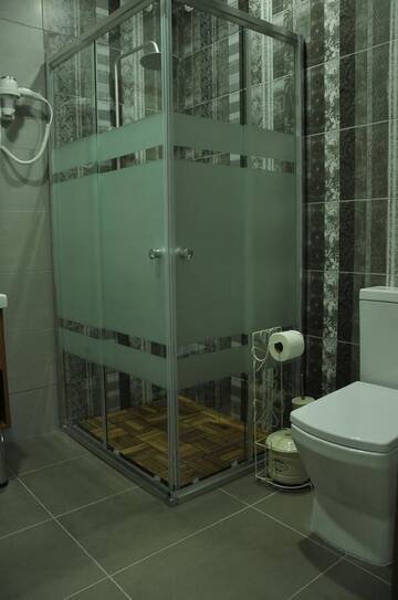 Фото номера Стандартный семейный номер Гостевой дом palm hotel г. Батуми 10