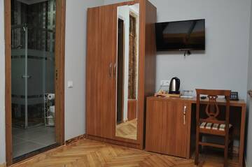 Фото номера Стандартный семейный номер Гостевой дом palm hotel г. Батуми 12