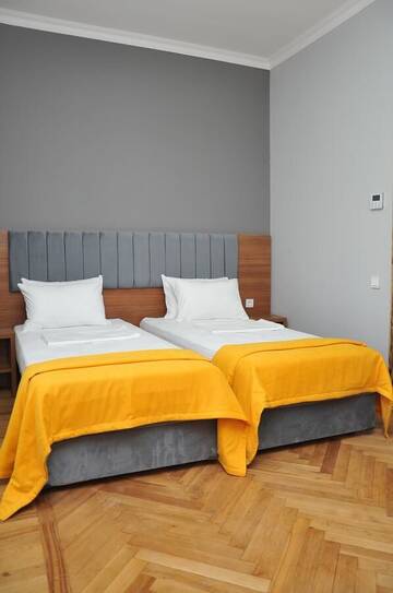 Фото номера Стандартный семейный номер Гостевой дом palm hotel г. Батуми 16