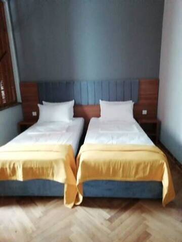 Фото номера Стандартный семейный номер Гостевой дом palm hotel г. Батуми 35