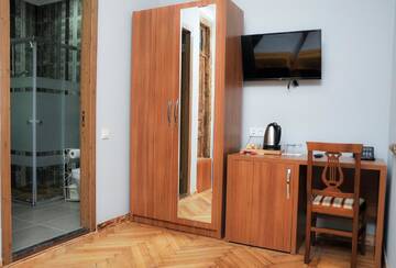 Фото номера Стандартный семейный номер Гостевой дом palm hotel г. Батуми 38