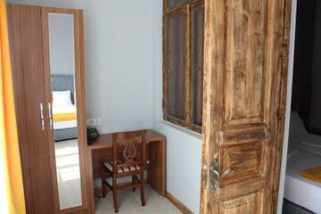 Фото номера Стандартный семейный номер Гостевой дом palm hotel г. Батуми 33
