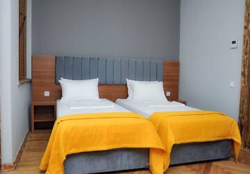 Фото номера Стандартный семейный номер Гостевой дом palm hotel г. Батуми 39