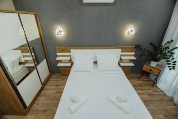 Фото номера Двухместный номер с 1 кроватью и балконом Отель Butic Home г. Батуми 4