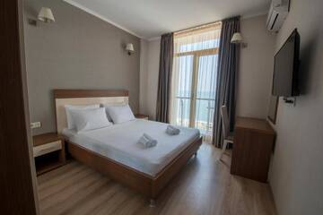 Фото номера Двухместный номер Делюкс с 1 кроватью и видом на море Отель Orbi Plaza Hotel Official г. Батуми 4