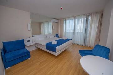 Фото номера Апартаменты с 1 спальней Апарт-отели Orbi city sea view г. Батуми 9